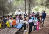 Monda recupera su bosque mediterráneo en La Alpujata con la participación de familias y escolares del municipio