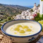 Almáchar prepara más de 4.000 litros de ajoblanco para celebrar este sábado una fiesta con más de medio siglo de historia